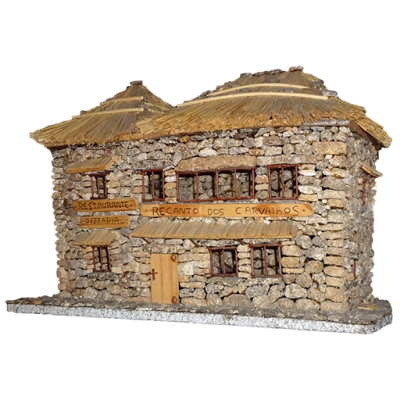 Casa grande em pedra e colmo